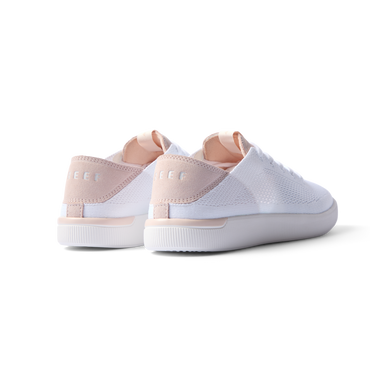 REEF Neptune women's white and blush sneakers facing backward showing heel with anatomical arch support and cushioning.