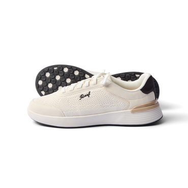 Side view of Shoreline Palisades sneaker in white with black heel, showing sole pattern and arch support design