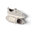 Lay Day Lite women's light gray sneakers top and side views showing knit upper, cushioned sole, and anatomical arch support