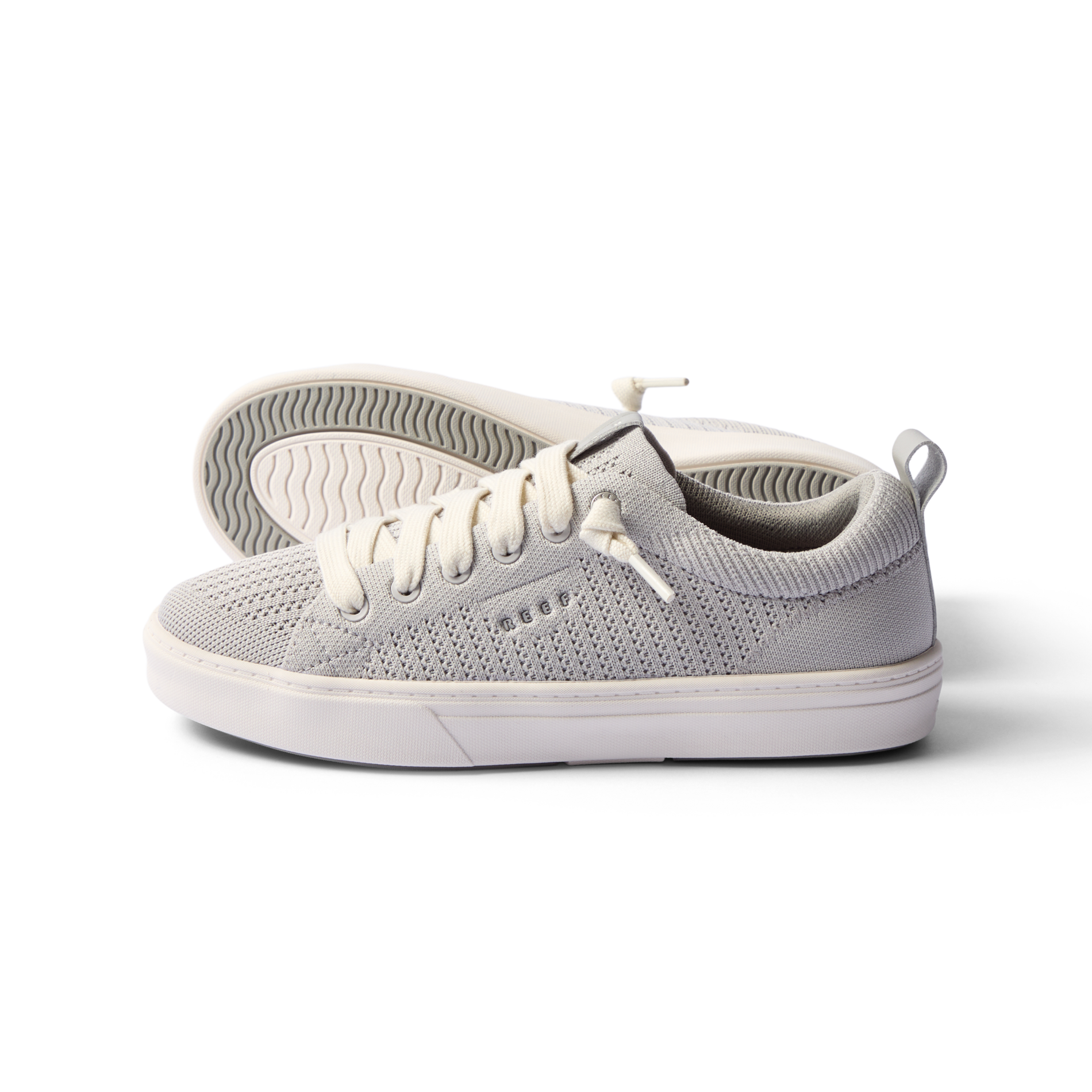 Lay Day Lite women's sneaker facing right, close-up of knit upper and cushioned sole for all-day beach comfort.