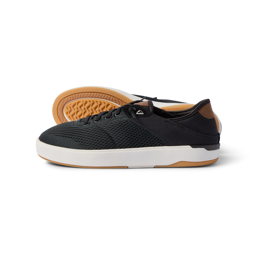 Side view of Laguna breathable black sneaker with cushioned sole, designed for beach comfort and everyday wear.