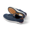 Pair of Laguna sneakers in navy with breathable mesh and rubber sole, left shoe facing left, right shoe showing sole details