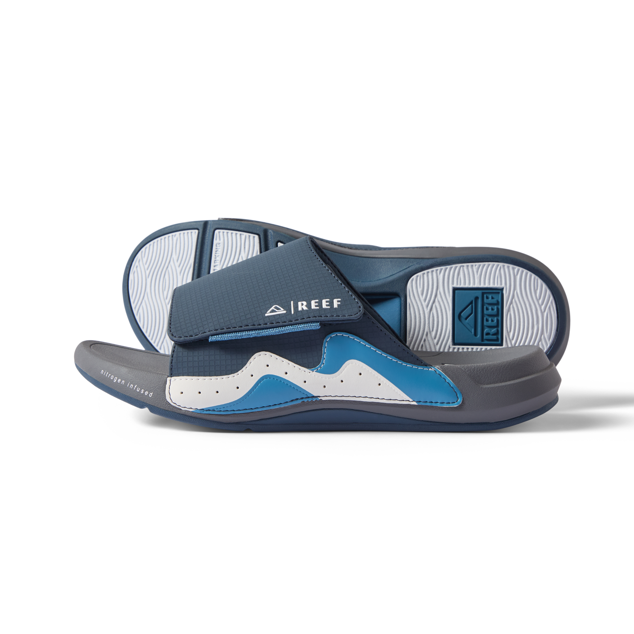 Pair of men's Cruiser Slide sandals facing right, showing top and sole, with extra cushioning and anatomical arch support.