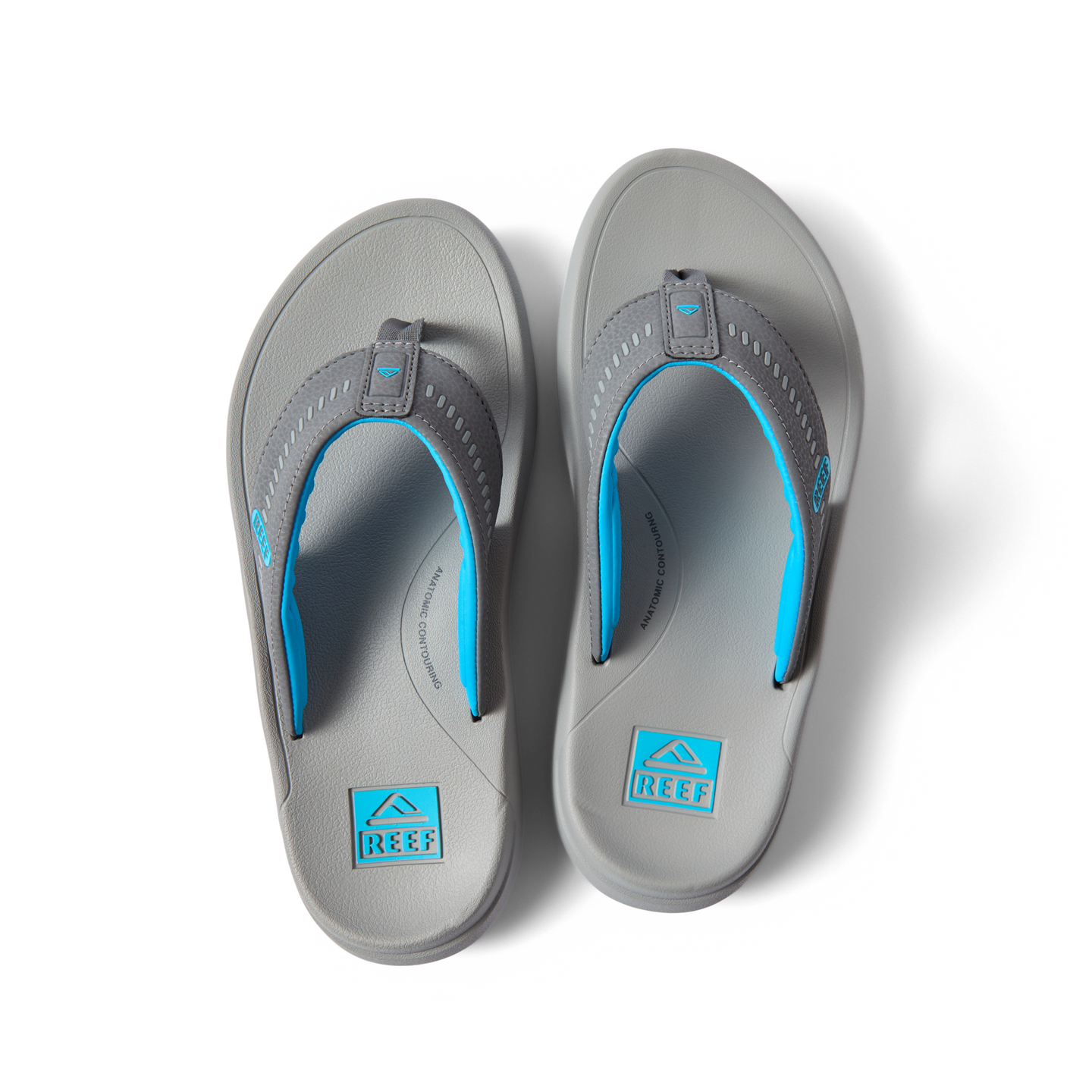 Top view of Cruiser men's grey and aqua flip flops with anatomical arch support and soft cushioning for beach comfort