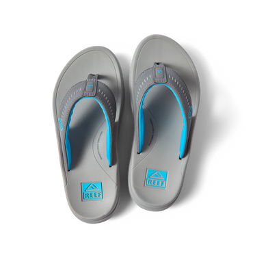Top view of Cruiser men's grey and aqua flip flops with anatomical arch support and soft cushioning for beach comfort