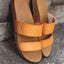 Pair of tan Cushion Vista sandals facing forward with dual straps and contoured cushioned footbed by REEF.