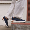 Shoreline Del Mar navy sneakers facing right with cushioned support and beach inspired comfort
