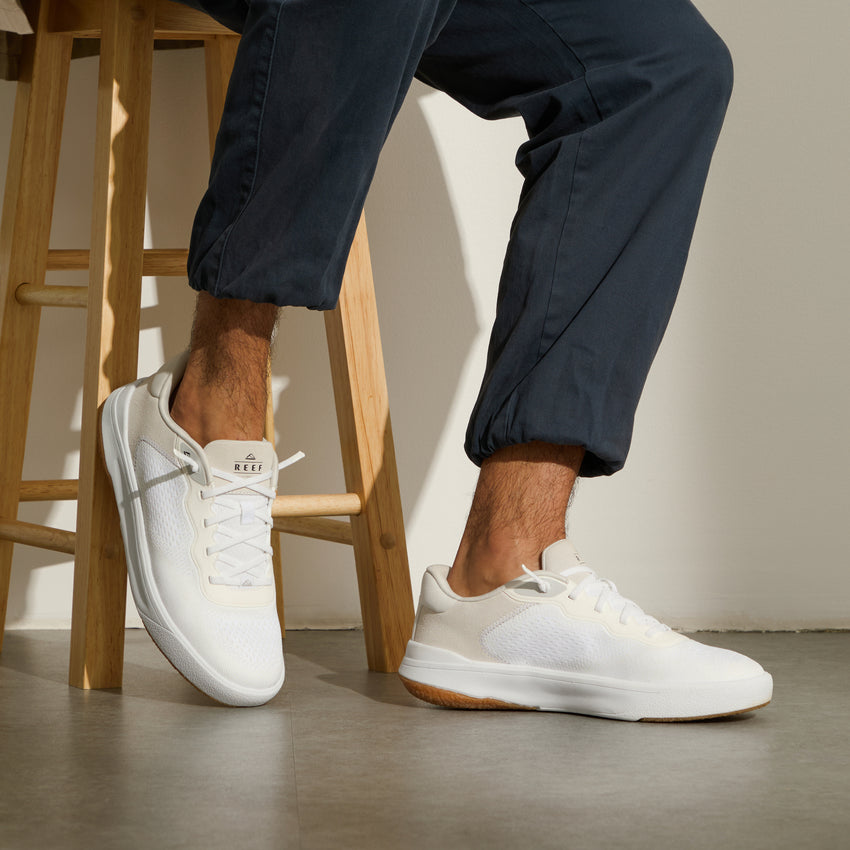Shoreline Del Mar white REEF sneakers facing right, shown on feet with cushioned comfort for everyday wear