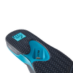 REEF Fanning flip flop outsole facing viewer, toe pointing upper left, close-up of textured tread and arch support