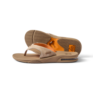 Fanning men's tan flip flop sandals showing top and bottom, facing right, with arch support and soft cushioning for comfort.