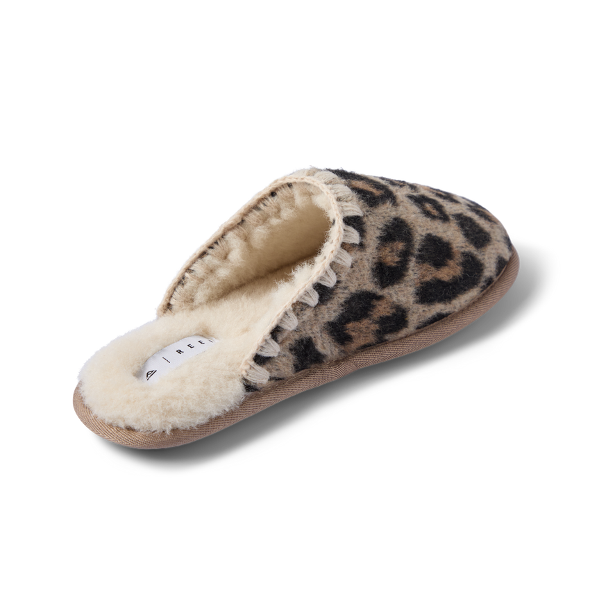 Iryss Slipper leopard print house slipper facing lower left with plush faux fur lining and cushioned footbed