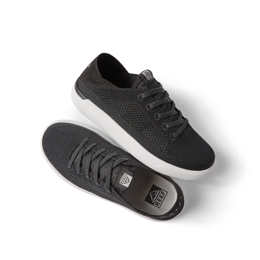 Top and side views of black Kids Neptune sneaker for kids with mesh upper and white sole, facing right, comfort focused design.