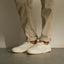 Laguna white sneakers facing left with breathable uppers and cushioned comfort