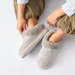 Mikayla grey faux fur lined slip on shoes with toes facing forward