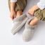 Mikayla grey faux fur lined slip on shoes with toes facing forward