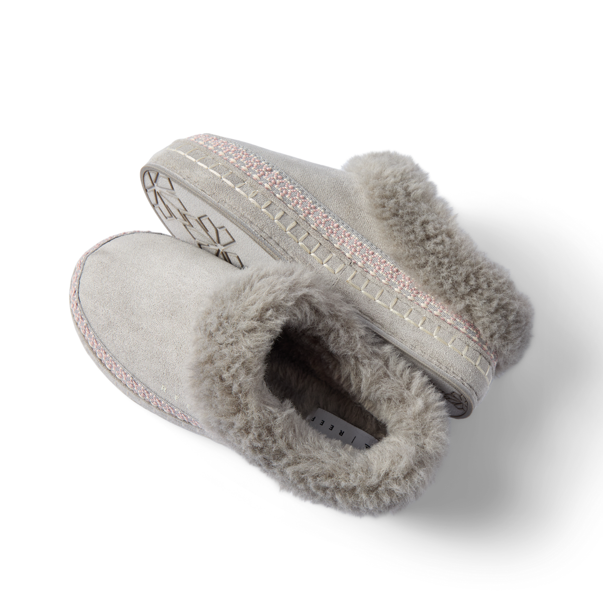 Mikayla gray faux fur slippers facing left with plush collars and cushioned soles