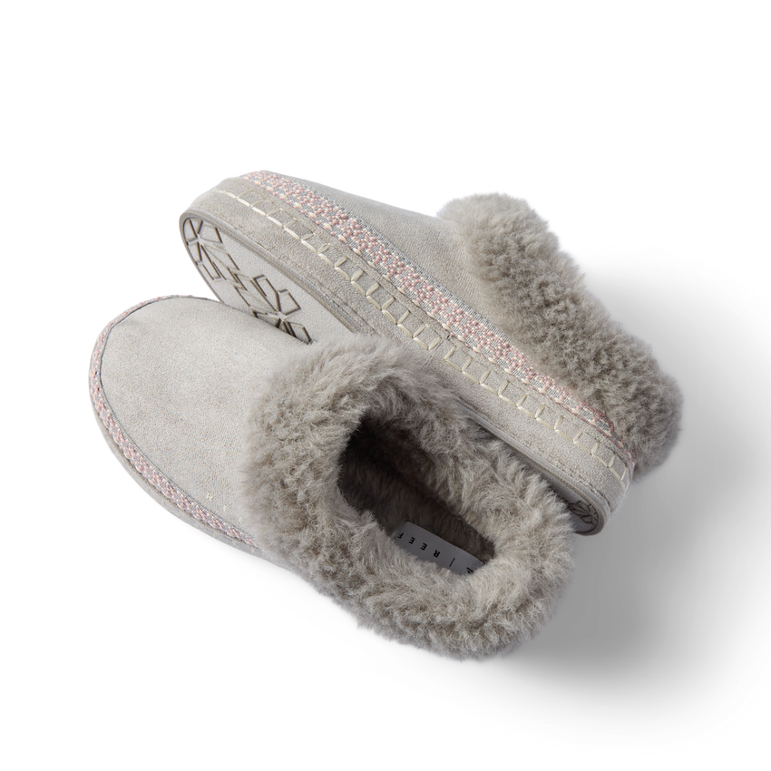 Mikayla gray faux fur slippers facing left with plush collars and cushioned soles