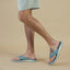 Offshore men's sandals facing right, side view, showing footbed and soft-rebound cushioning, beach-inspired comfort and support.