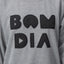 Close-up of the chest area on the women's Oversized Raglan Fleece in heather grey with bold black graphic letters.