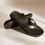 Vista Porto Cruz women's black flip flops facing right, close-up of footbed with floral texture, arch support sandals.