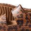 Close-up of the side and top straps of Reef Water Vista women's sandals facing left with animal print and water-friendly materials.