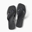 Solaye black square toe flip flops with glossy jelly straps toes facing upward