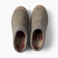 Top view of taupe slip-on clogs facing upward, with ribbed collars and soft plaid footbeds.