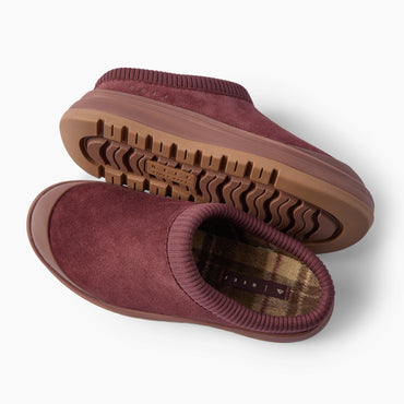 Burgundy slip-on shoes facing left, showing a rugged outsole and plaid-lined footbed with cushioned comfort