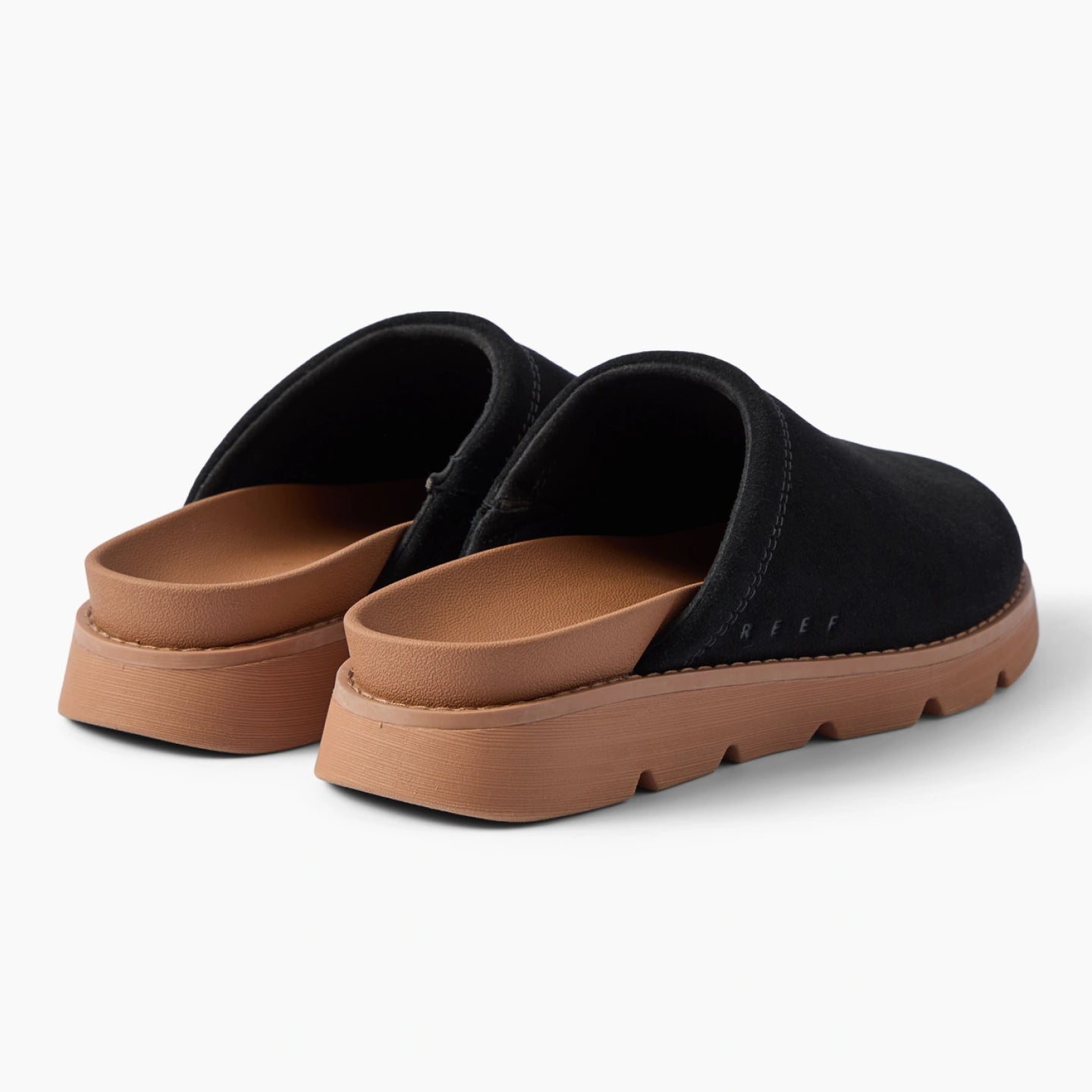 Vista Luxe Mariana black suede clogs viewed from the rear facing right with cushioned footbeds