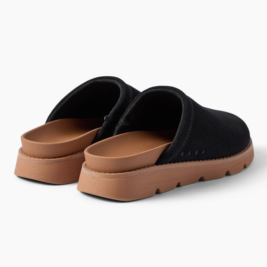 Vista Luxe Mariana black suede clogs viewed from the rear facing right with cushioned footbeds