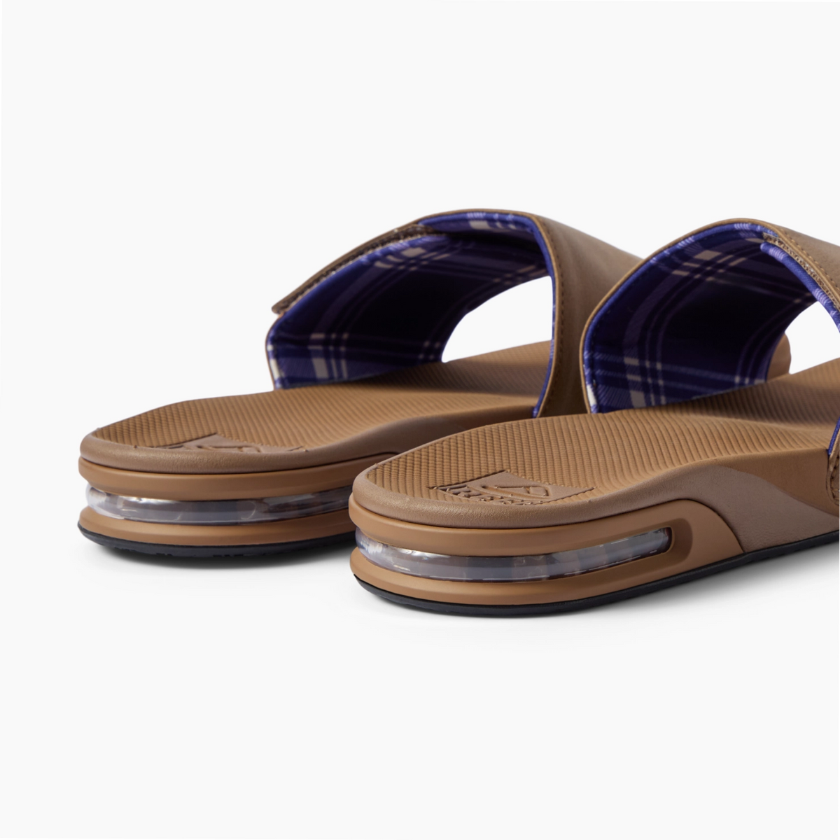 Fanning Slide men's brown slides facing left with cushioned footbeds and plaid straps