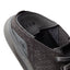 Close-up of the men's Neptune HT black sneaker heel and collar with soft cushioning and anatomical arch support features.