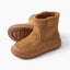 Pair of tan ankle boots facing left, featuring ribbed collars, stitched panels, and textured rubber soles.