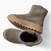 Pair of brown ankle boots with toes facing left, shown from side and top views with rugged traction soles