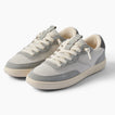 Kickback gray sneakers facing left, with layered panels, perforated toes, and cushioned everyday comfort.
