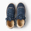 Kickback sneakers with toes facing upward showing the laces toe boxes and cushioned footbeds in close view