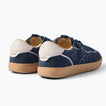 Kickback navy sneakers, pair shown with the front shoe facing right and the heel of the other shoe visible