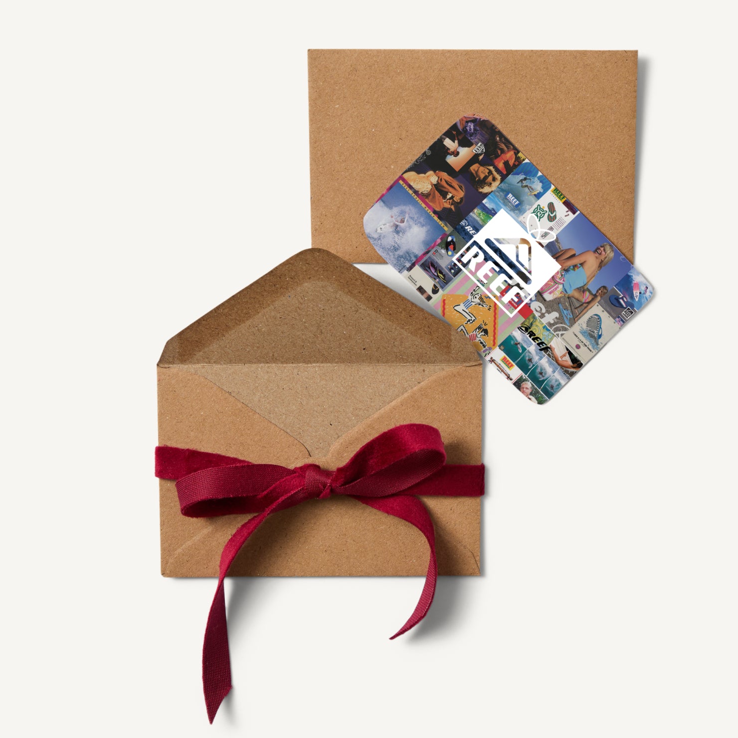 Reef Digital Gift Card with colorful surf-inspired images beside an open kraft envelope tied with a red ribbon.