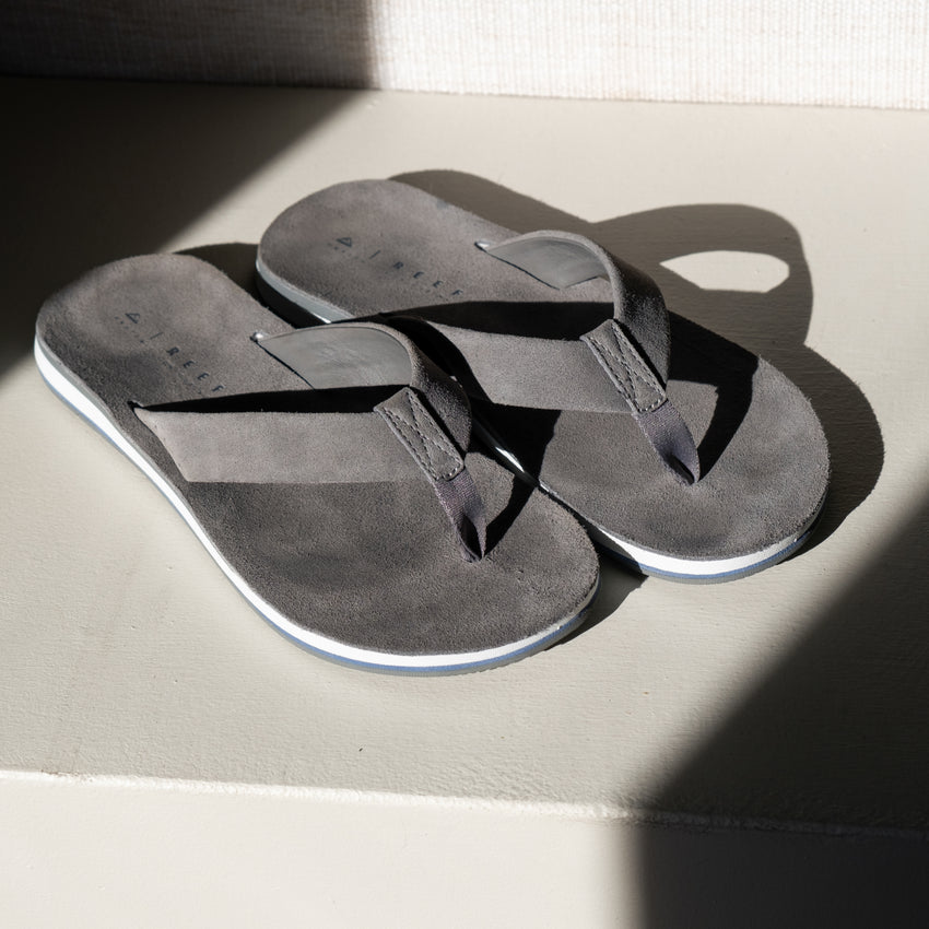 Ojai Classic men's grey flip flops facing upward showing top straps and soft-rebound cushioned footbed for comfort.