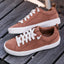 Lay Day Lite brown sneakers facing left with white laces and cushioned soles for everyday comfort