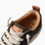 Close-up of the Lay Day Dawn left charcoal suede shoe facing forward with soft cushioning and arch support for comfort.