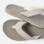 Top view close-up of the Nox men's flip flops in greige with soft-rebound cushioning and arch support facing right