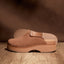 Vista Skye clog in brown suede facing left, showing side profile with platform sole and textured outsole, comfort design.