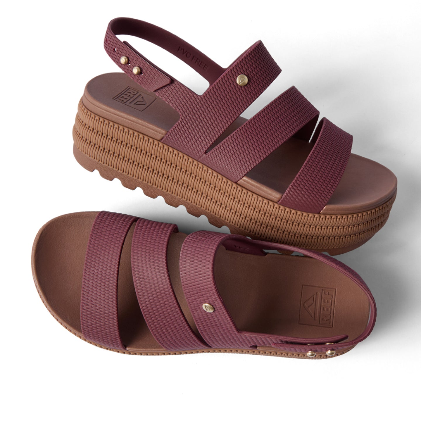 Top view and right side view of maroon platform sandals with textured straps and cushioned sole facing right