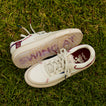 Palm X G-Papi cream sneakers facing opposite directions on grass with cushioned comfort