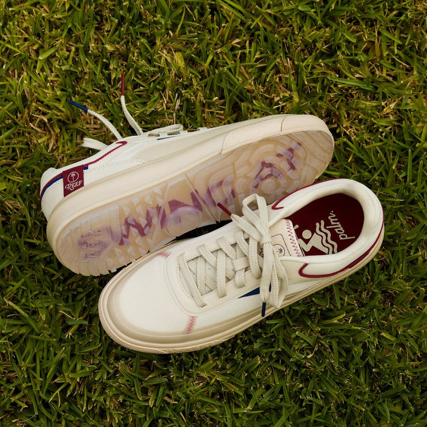 Palm X G-Papi cream sneakers facing opposite directions on grass with cushioned comfort