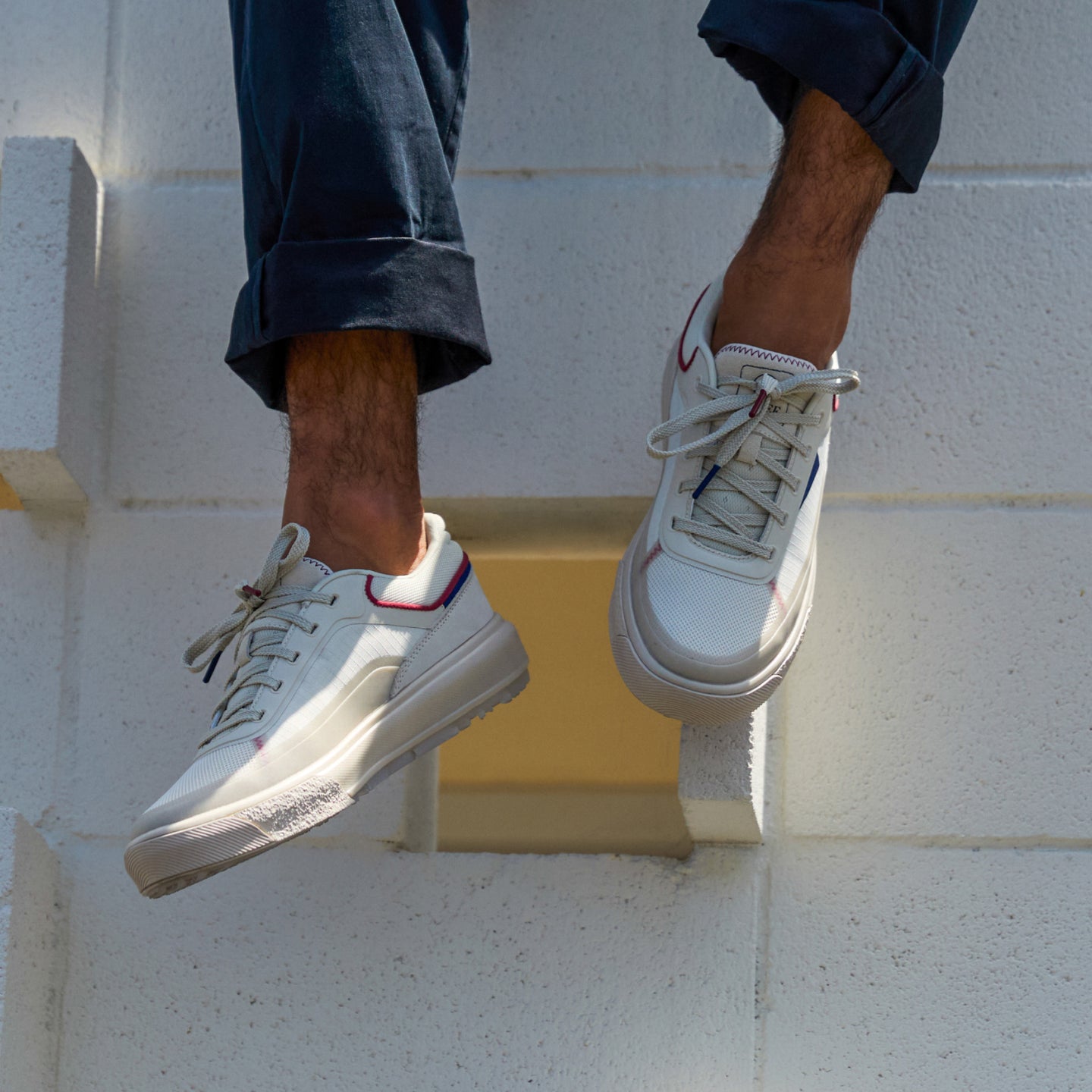 Palm X G-Papi white sneakers, one facing left and one facing forward, with cushioned soles