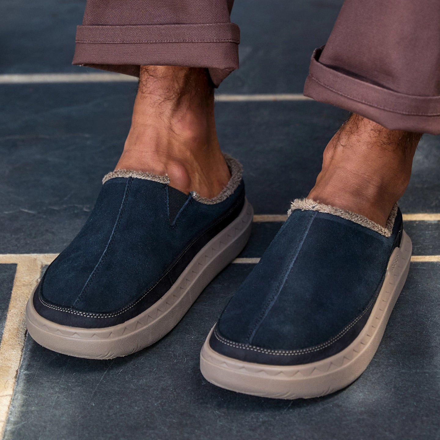 Rambler Mule close up showing the front of both mules facing forward with plush lining and cushioned soles