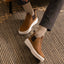 Evo men's brown slip-on shoes facing right, showing side and top with cushioned sole and arch support design.