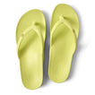 Vista Vay-Cay women’s lime green flip flops facing up, showing soft-rebound cushioning and anatomical arch support